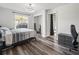 Bright bedroom with plush bed and plenty of floor space at 8755 Bardmoor Blvd # 105, Seminole, FL 33777