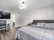 Main bedroom with king-size bed and en-suite bathroom at 8755 Bardmoor Blvd # 105, Seminole, FL 33777
