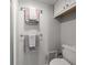 Bathroom with toilet and double towel racks at 9815 Harrell Ave # 302, Treasure Island, FL 33706