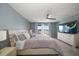 Bright bedroom with king-size bed and water views at 9815 Harrell Ave # 302, Treasure Island, FL 33706