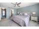 King-size bed in bedroom with access to bathroom at 9815 Harrell Ave # 302, Treasure Island, FL 33706