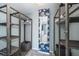 Walk-in closet with shelving and full-length mirror at 9815 Harrell Ave # 302, Treasure Island, FL 33706