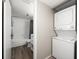 Stackable washer and dryer in a small closet at 9815 Harrell Ave # 302, Treasure Island, FL 33706