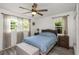 Cozy bedroom with a ceiling fan and ample natural light at 1002 Hull S St, Gulfport, FL 33707