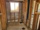 Unfinished bathroom with plumbing and a window at 1016 Mandalay Ave, Clearwater Beach, FL 33767