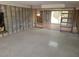 Under renovation living room featuring terrazzo floors and open framing at 1016 Mandalay Ave, Clearwater Beach, FL 33767