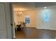 Elegant dining room with chandelier and hardwood floors at 10930 Banyan Wood Way, Riverview, FL 33579