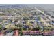 High-angle view of a sprawling neighborhood with diverse housing and greenery at 11511 113Th St # 27C, Largo, FL 33778