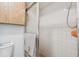 Bathroom interior showcasing a shower stall with white tile walls at 11511 113Th St # 27C, Largo, FL 33778