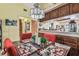 Dining area with decorative table setting and view to the kitchen at 11511 113Th St # 27C, Largo, FL 33778