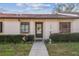 Inviting front exterior of a single-story home with a well-maintained walkway and landscaping at 11511 113Th St # 27C, Largo, FL 33778