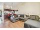 Living room with a sectional sofa and view into the dining area and kitchen at 11511 113Th St # 27C, Largo, FL 33778