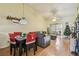 Living room with couch, ceiling fan, and sliding glass doors at 11511 113Th St # 27C, Largo, FL 33778