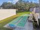 Shuffleboard courts and bench surrounded by landscaping at 11511 113Th St # 27C, Largo, FL 33778