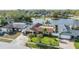 House nestled in a neighborhood near a lake, featuring a large backyard at 12103 Kay Dr, Seminole, FL 33772