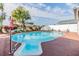 Inviting kidney-shaped pool with a spacious deck at 12103 Kay Dr, Seminole, FL 33772