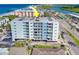 Condo building's aerial view, showing its proximity to the beach and waterway at 18320 Gulf Blvd # 303, Redington Shores, FL 33708