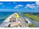 Coastal condo building's aerial view, highlighting its beachfront location at 18320 Gulf Blvd # 303, Redington Shores, FL 33708