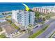 Aerial perspective of a condo building, highlighting its beachfront location at 18320 Gulf Blvd # 303, Redington Shores, FL 33708