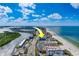 Aerial view showing condo building's location near beach and waterway at 18320 Gulf Blvd # 303, Redington Shores, FL 33708