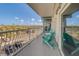 Relaxing balcony with patio furniture and ocean view at 18320 Gulf Blvd # 303, Redington Shores, FL 33708