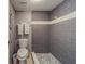 Gray tiled shower and toilet in this bathroom at 18320 Gulf Blvd # 303, Redington Shores, FL 33708
