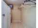 Walk-in closet with built-in shelving and hanging rods at 18320 Gulf Blvd # 303, Redington Shores, FL 33708