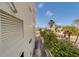 Building exterior showcasing ocean and tropical landscape at 18320 Gulf Blvd # 303, Redington Shores, FL 33708