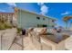 Outdoor grilling station with two built-in grills and granite countertops at 18320 Gulf Blvd # 303, Redington Shores, FL 33708