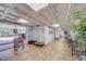 Bright hallway with tiled floors and luggage cart at 18320 Gulf Blvd # 303, Redington Shores, FL 33708