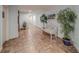 Shared hallway with tiled floors and seating at 18320 Gulf Blvd # 303, Redington Shores, FL 33708