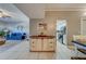 Open kitchen with white cabinets and modern appliances at 18320 Gulf Blvd # 303, Redington Shores, FL 33708