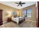 Charming bedroom with carpeted floors and a beautiful wooden bed frame at 225 Mystic Falls Dr, Apollo Beach, FL 33572