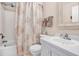 Bathroom with white vanity and shower/tub combo at 2465 Northside Dr # 1808, Clearwater, FL 33761