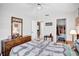 Bedroom with a walk-in closet and a large bed at 2465 Northside Dr # 1808, Clearwater, FL 33761