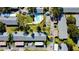 Aerial view of the community pool, parking, and surrounding buildings at 2465 Northside Dr # 1808, Clearwater, FL 33761