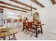 Dining area with exposed beams, chandelier, and view of the kitchen at 2465 Northside Dr # 1808, Clearwater, FL 33761