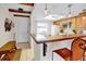 Kitchen with wood beam ceiling, butcher block countertops, and seating area at 2465 Northside Dr # 1808, Clearwater, FL 33761