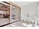 Inviting patio with sliding glass doors, offering a glimpse into the dining area at 2465 Northside Dr # 1808, Clearwater, FL 33761