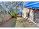 Backyard featuring a lawn and a wooden fence for privacy at 2529 Clareside Dr, Valrico, FL 33596