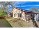 Side view of the backyard featuring a fenced yard and well-maintained lawn at 2529 Clareside Dr, Valrico, FL 33596