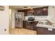 Modern kitchen with stainless steel appliances and granite countertops at 2713 Apia Pl, Holiday, FL 34691