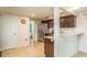 Modern kitchen with stainless steel appliances and granite countertops at 2713 Apia Pl, Holiday, FL 34691