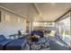 Relaxing screened porch with wicker furniture at 2713 Apia Pl, Holiday, FL 34691