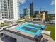 Aerial view of building with tennis and basketball courts at 2910 W Barcelona St # 1901, Tampa, FL 33629