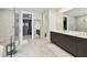 Modern bathroom with double vanity and a large walk-in shower at 2910 W Barcelona St # 1901, Tampa, FL 33629