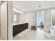 Elegant bathroom with double vanity and a large shower at 2910 W Barcelona St # 1901, Tampa, FL 33629