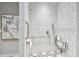 Spa-like bathroom featuring a walk-in shower with accessible features at 2910 W Barcelona St # 1901, Tampa, FL 33629