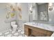 Modern bathroom with marble vanity and geometric tile floor at 2910 W Barcelona St # 1901, Tampa, FL 33629