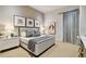 Spacious bedroom with plush bed and tasteful artwork at 2910 W Barcelona St # 1901, Tampa, FL 33629